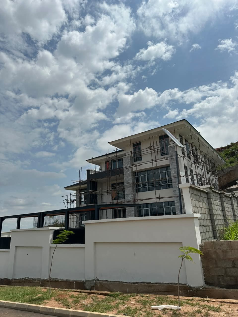 Obembe Construction engineers review structural blueprints on site